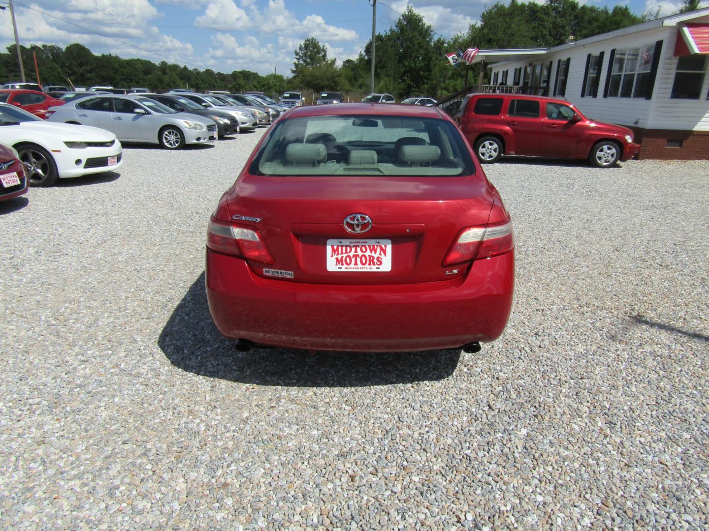2007 Red /Tan Toyota Camry (4T1BK46K97U) with an 4 CYL engine, Automatic transmission, located at 15016 S Hwy 231, Midland City, AL, 36350, (334) 983-3001, 31.306210, -85.495277 - Photo#6